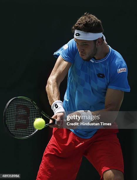 Czech tennis player Jiri Vesely in action against Indian tennis player Yuki Bhambri during a Davis Cup World Group play-off tennis match at R. K....