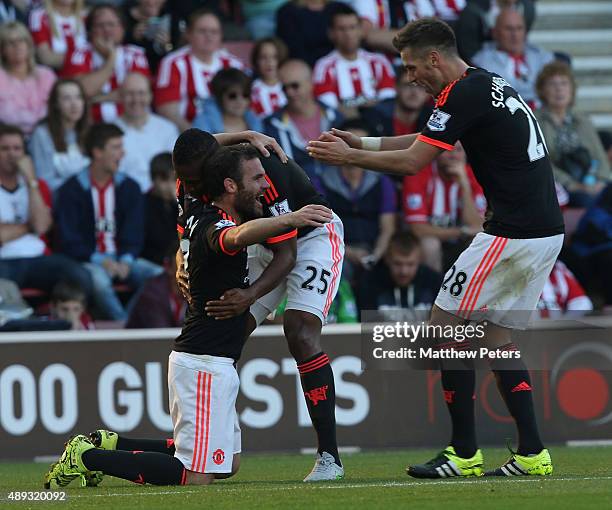 Juan Mata of Manchester United celebrates scoring their third goal during the Barclays Premier League match between Southampton and Manchester United...