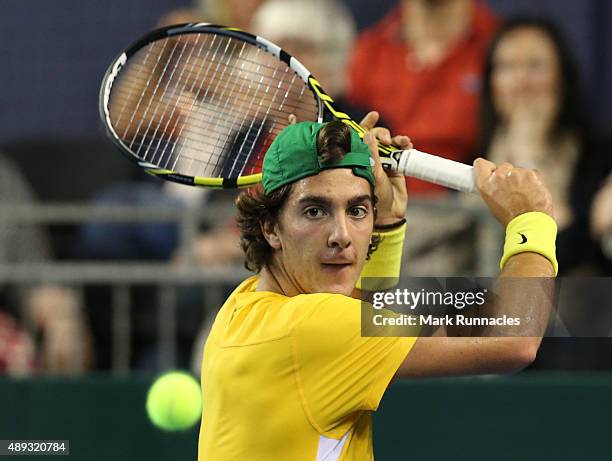 Thanasi Kokkinakis of Australia in action during his singles match with Dan Evens of Great Britain on the third day of the Davis Cup Semi Final 2015...