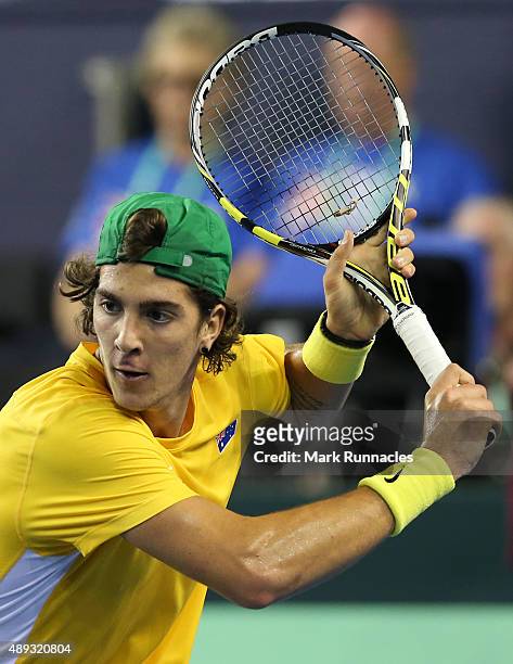 Thanasi Kokkinakis of Australia in action during his singles match with Dan Evens of Great Britain on the third day of the Davis Cup Semi Final 2015...
