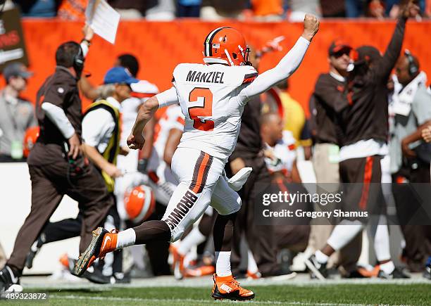 Johnny Manziel of the Cleveland Browns celebrates a first quarter touchdown pass while playing the Tennessee Titans at FirstEnergy Stadium on...