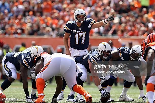Philip Rivers of the San Diego Chargers calls a play at the line of scrimmage during the first quarter of the game against the Cincinnati Bengals at...