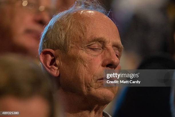 Delegate rests as he waits for the Liberal Democrats Tim Farron to speak on the second day of the Liberal Democrats annual conference on September...