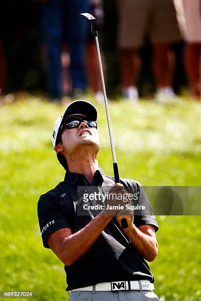 Kevin Na reacts after missing a putt on the third green during the Final Round of the BMW Championship at Conway Farms Golf Club on September 20,...
