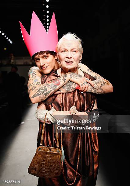 Fashion designer Vivienne Westwood with a model ahead of her Red Label show during London Fashion Week Spring/Summer 2016 on September 20, 2015 in...