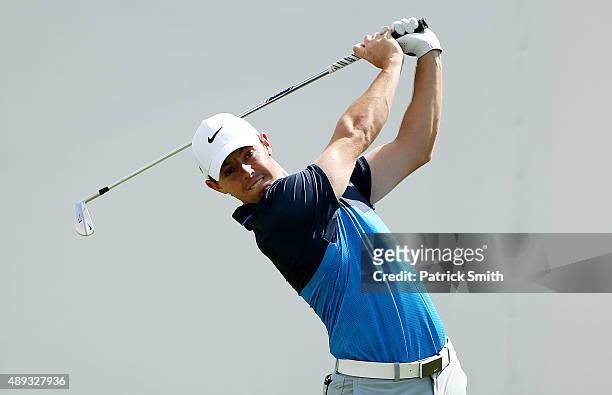 Rory McIlroy of Northern Ireland plays his shot from the first tee during the Final Round of the BMW Championship at Conway Farms Golf Club on...