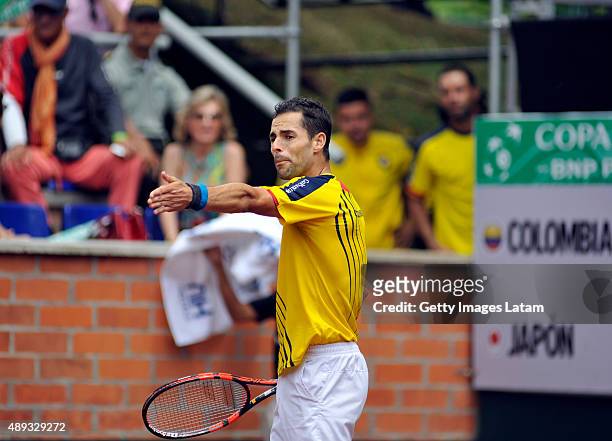 Santiago Giraldo of Colombia gestures during the Davis Cup World Group Play-off singles match between Santiago Giraldo of Colombia and Kei Nishikori...