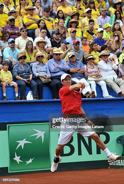 Kei Nishikori of Japan in action during the Davis Cup World Group Play-off singles match between Santiago Giraldo of Colombia and Kei Nishikori of...