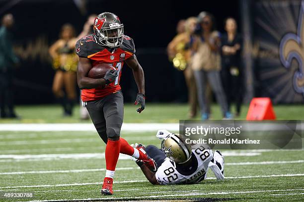 Alterraun Verner of the Tampa Bay Buccaneers runs for yards following an interception during the third quarter of a game against the New Orleans...