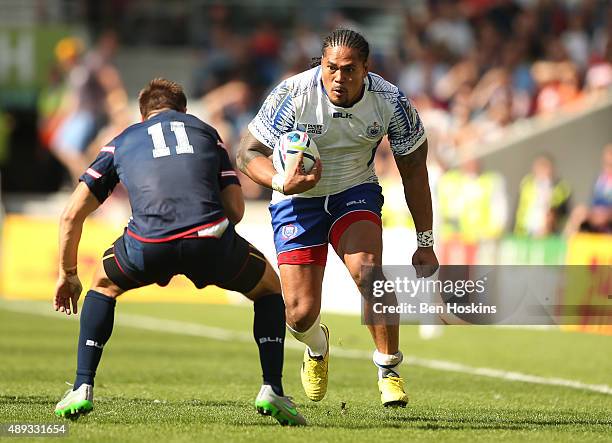 Alesana Tuilagi of Samoa takes on Chris Wyles of the United States during the 2015 Rugby World Cup Pool B match between Samoa and USA at Brighton...