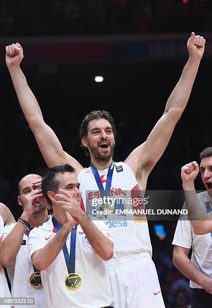 Spain's center Pau Gasol and his teammates celebrate after Spain won the final basketball match between Spain and Lithuania at the EuroBasket 2015 in...