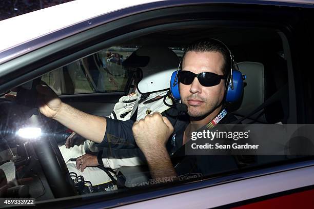 Actor Jon Seda of the tv show Chicago P.D. Is the honorary pace car driver during the NASCAR Sprint Cup Series myAFibRisk.com 400 at Chicagoland...