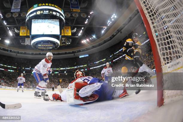 Loui Eriksson of the Boston Bruins scores a goal against Carey Price of the Montreal Canadiens in Game Five of the Second Round of the 2014 Stanley...