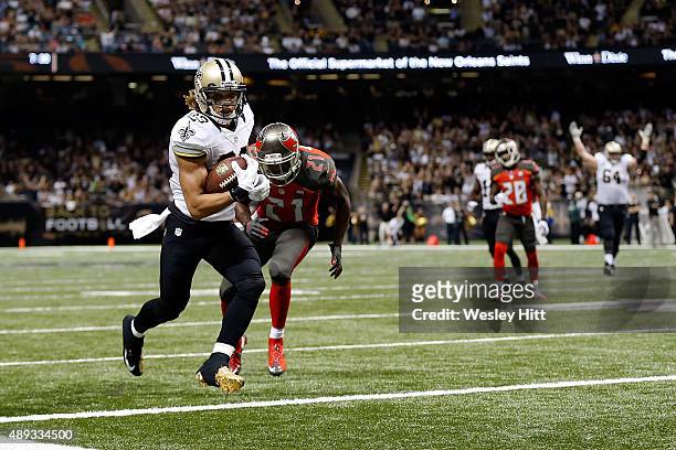 Willie Snead of the New Orleans Saints catches a pass for a touchdown in front of Alterraun Verner of the Tampa Bay Buccaneers during the fourth...
