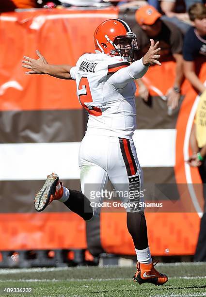 Johnny Manziel of the Cleveland Browns celebrates a fourth quarter touchdown pass while playing the Tennessee Titans at FirstEnergy Stadium on...