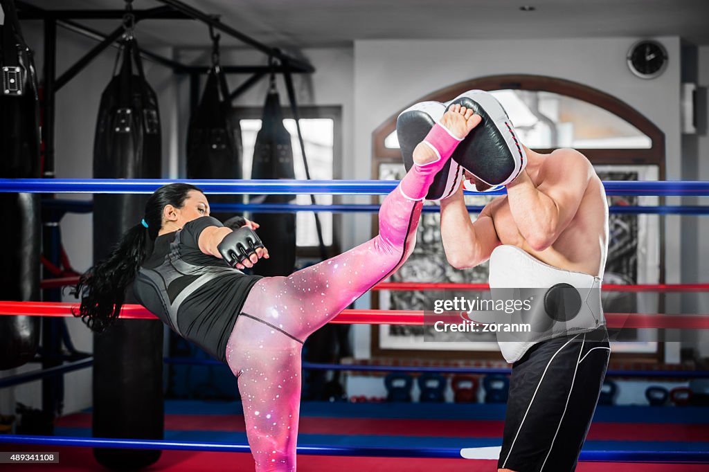 Woman practicing kickbox