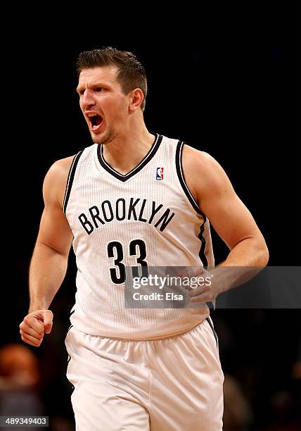 Mirza Teletovic of the Brooklyn Nets celebrates his shot in the second half against the Miami Heat in Game Three of the Eastern Conference Semifinals...