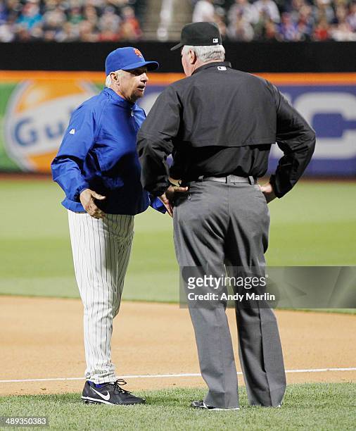 Manager Terry Collins of the New York Mets disputes a call at first base with umpire Tim Welke during the game with the Philadelphia Phillies at Citi...