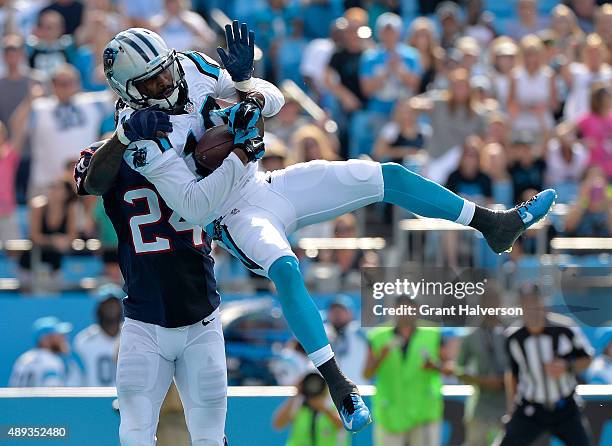Corey Brown of the Carolina Panthers catches a fourth quarter touchdown pass against Johnathan Joseph of the Houston Texans during their game at Bank...