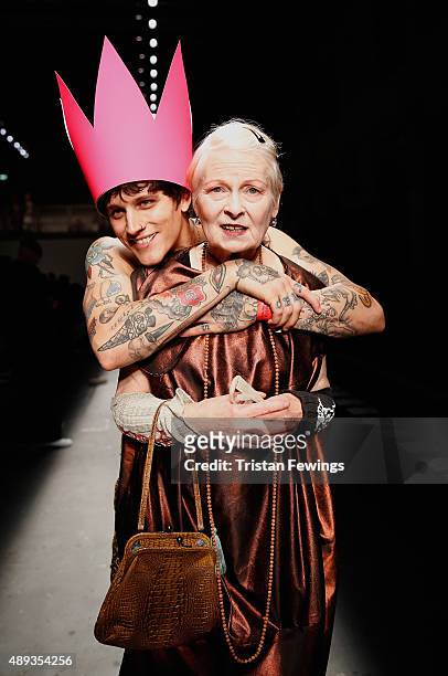 Fashion designer Vivienne Westwood with a model ahead of her Red Label show during London Fashion Week Spring/Summer 2016 on September 20, 2015 in...