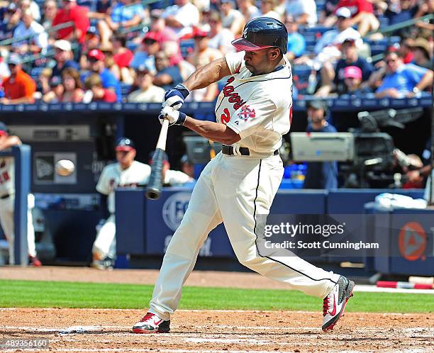 Michael Bourn of the Atlanta Braves hits a first inning double against the Philadelphia Philiies at Turner Field on September 20, 2015 in Atlanta,...