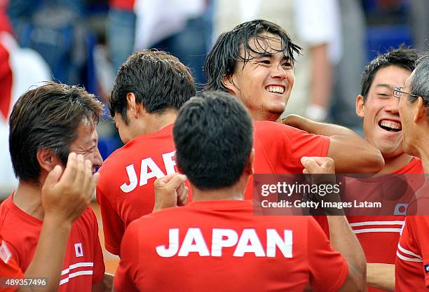 The Japanese team celebrates after defeating the Colombian team during the Davis Cup World Group Play-off at Club Campestre on September 20, 2015 in...