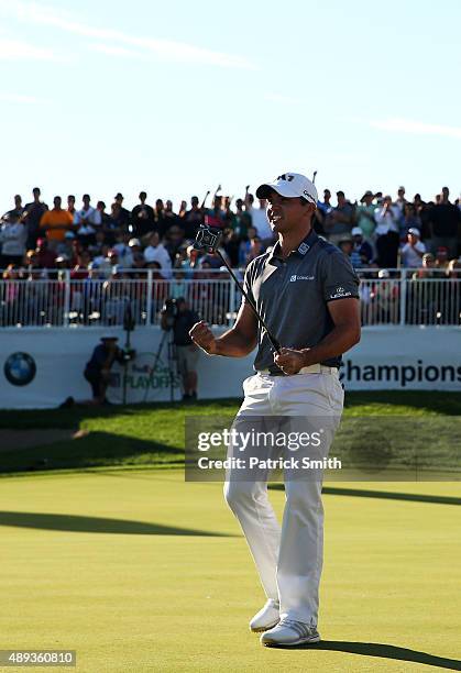 Jason Day of Australia celebrates winning the Final Round of the BMW Championship at Conway Farms Golf Club on September 20, 2015 in Lake Forest,...