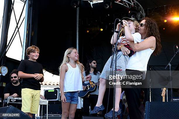 Minnie Driver lifts her son Henry Story Driver to the mic during day 3 of KAABOO Del Mar at the Del Mar Fairgrounds on September 20, 2015 in Del Mar,...