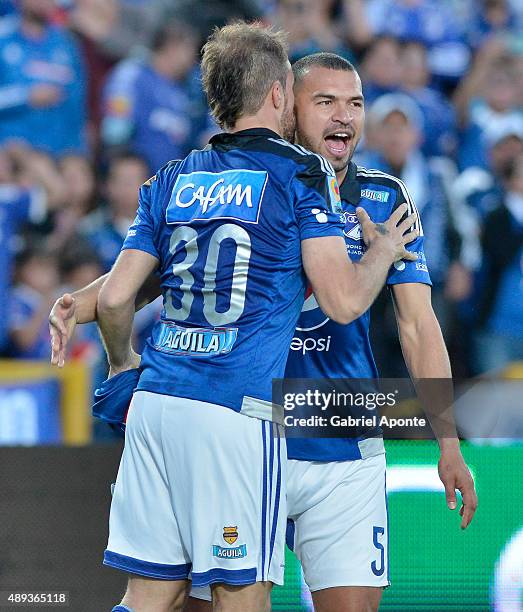 Federico Insua of Millonarios celebrates the opening goal with teammate Andrés Cadavid during a match between Millonarios and Uniautonoma as part of...