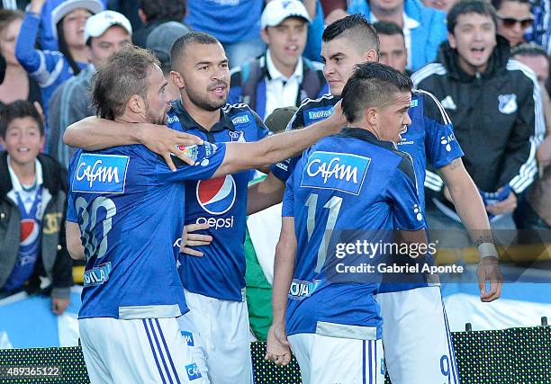 Federico Insua of Millonarios celebrates with teamates after scoring the opening goal during a match between Millonarios and Uniautonoma as part of...