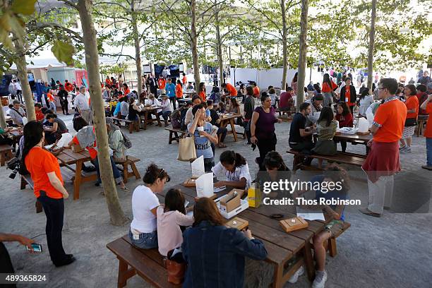 Guests participate in the Shinnyo Lantern Floating for Peace Ceremony at Lincoln Center for the Performing Arts on September 20, 2015 in New York...