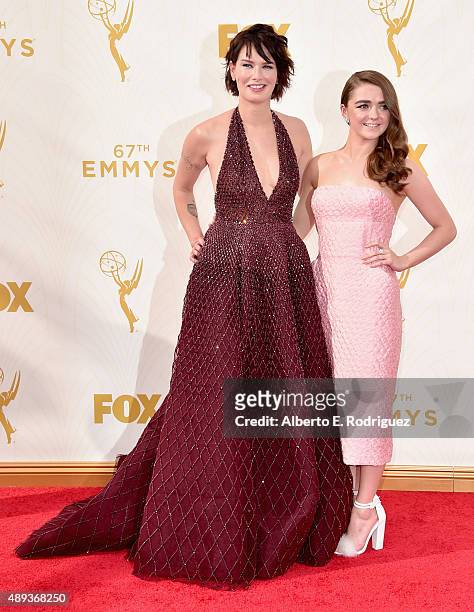 Actresses Lena Headey and Maisie Williams attend the 67th Emmy Awards at Microsoft Theater on September 20, 2015 in Los Angeles, California. 25720_001