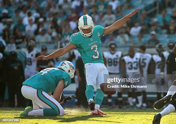 Andrew Franks of the Miami Dolphins kicks a field goal during a game against the Jacksonville Jaguars at EverBank Field on September 20, 2015 in...