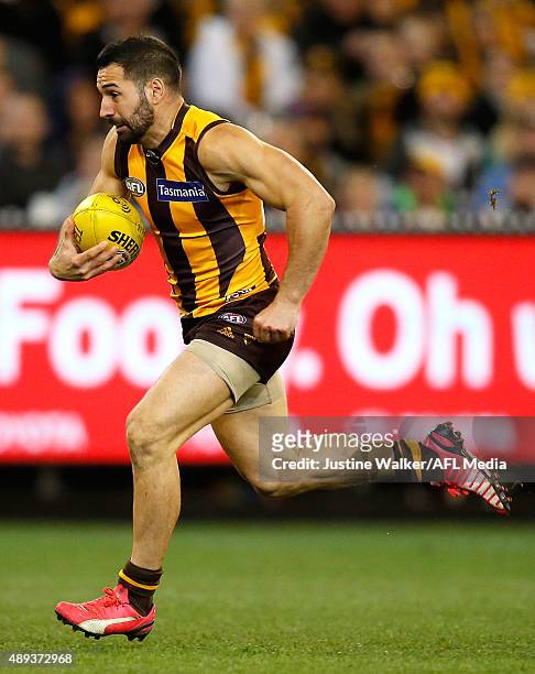 Paul Puopolo of the Hawks breaks away and goals during the 2015 AFL Second Semi Final match between the Hawthorn Hawks and the Adelaide Crows at the...