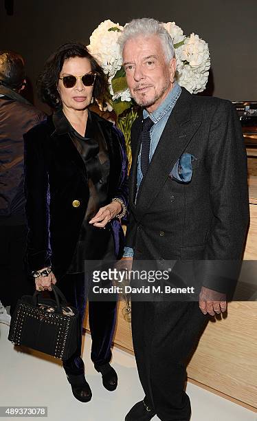 Nicky Haslam and Bianca Jagger attend the Louis Vuitton Series 3 VIP launch during London Fashion Week SS16 on September 20, 2015 in London, England.