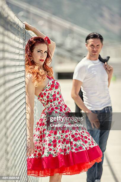 portrait of a1950s girl and her greaser boyfriend - rockabilly stock pictures, royalty-free photos & images
