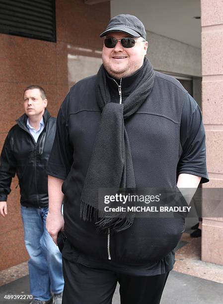 Megaupload founder Kim Dotcom leaves court for lunch in Auckland on September 21 as he fights a US bid to extradite him from New Zealand. Dotcom's...