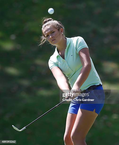 Grace Huffman chips during the Drive, Chip and Putt Tournament at the Congressional Country Club on September 20, 2015 in Bethesda, Maryland.