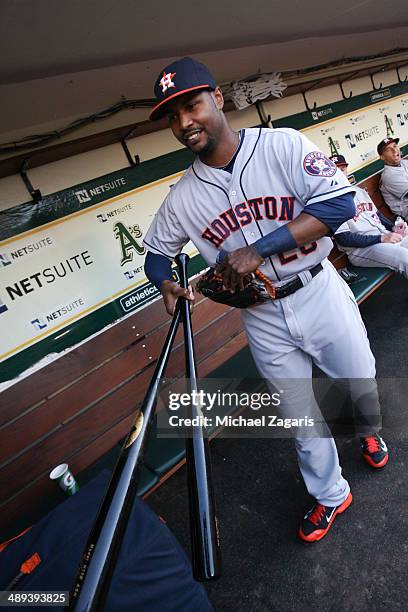 Hoes of the Houston Astros stands in the dugout prior to the game against the Oakland Athletics at O.co Coliseum on April 18, 2014 in Oakland,...