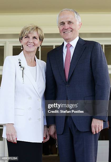 Prime Minister Malcolm Turnbull and Minister for Foreign Affairs Julie Bishop pose for photographers at Government House on September 21, 2015 in...