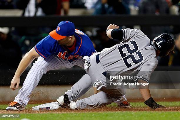 Jacoby Ellsbury of the New York Yankees is safe as David Wright of the New York Mets misplays the ball during the sixth inning at Citi Field on...