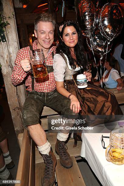 Michael Mittermeier and his wife Gudrun Mittermeier attend the Almauftrieb during the Oktoberfest 2015 at Kaeferschaenke beer tent on September 20,...