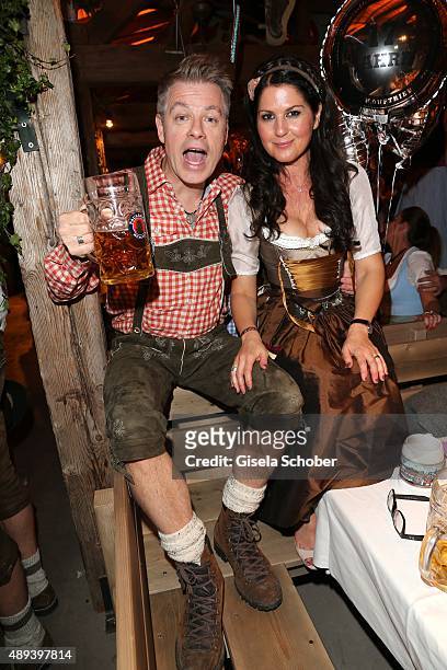 Michael Mittermeier and his wife Gudrun Mittermeier attend the Almauftrieb during the Oktoberfest 2015 at Kaeferschaenke beer tent on September 20,...
