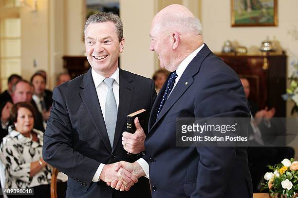 Minister for Industry, Innovation and Science Christopher Pyne is congratulated by Governor-General Sir Peter Cosgrove during the swearing-in...