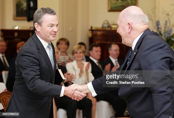 Minister for Industry, Innovation and Science Christopher Pyne is congratulated by Governor-General Sir Peter Cosgrove during the swearing-in...