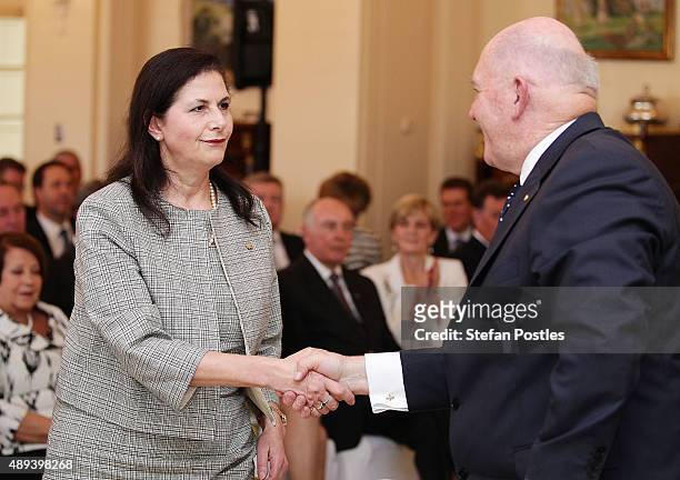 Assistant Minister for Multicultural Affairs Concetta Fierravanti-Wells is congratulated by Governor-General Sir Peter Cosgrove during the...
