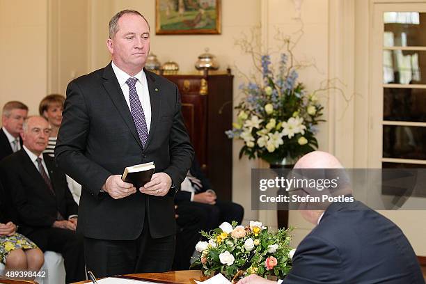 Minister for Agriculture and Water Resources Barnaby Joyce is sworn in by Governor-General Sir Peter Cosgrove during the swearing-in ceremony of the...