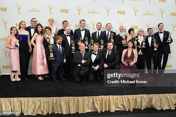 The cast and crew of "Game of Thrones", winners of Outstanding Drama Series, pose in the press room at the 67th Annual Primetime Emmy Awards at...