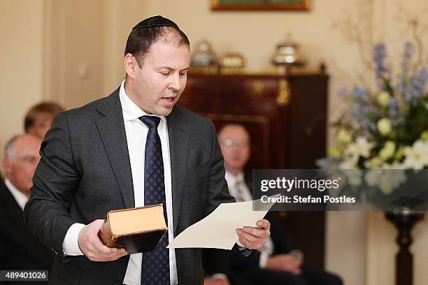 Resources, Energy and Northern Australia Minister Josh Frydenberg is sworn in by Governor-General Sir Peter Cosgrove during the swearing-in ceremony...