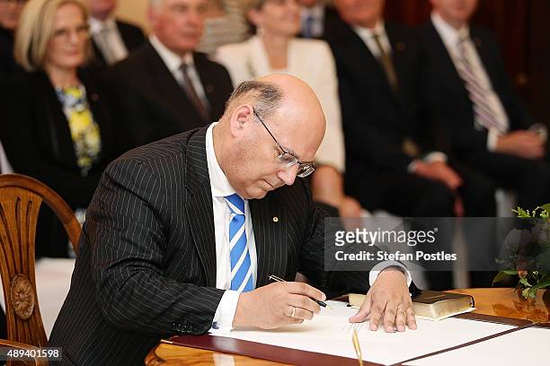 ÜCabinet Secretary Arthur Sinodinos is sworn in by Governor-General Sir Peter Cosgrove during the swearing-in ceremony of the new Turnbull Government...